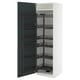 Modern white kitchen cabinet with pull-out spice racks in glossy gray-green; sleek design.
