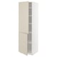 A white METOD kitchen cabinet with beige doors and shelves. The cabinet has a modern, smooth design with adjustable inner shelves.