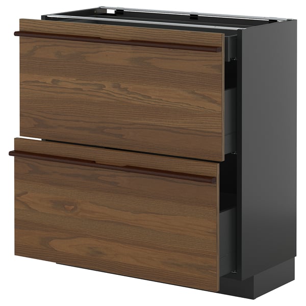 An ikea METOD kitchen unit in dark brown stain with wooden handles, featuring two drawers and a cabinet.