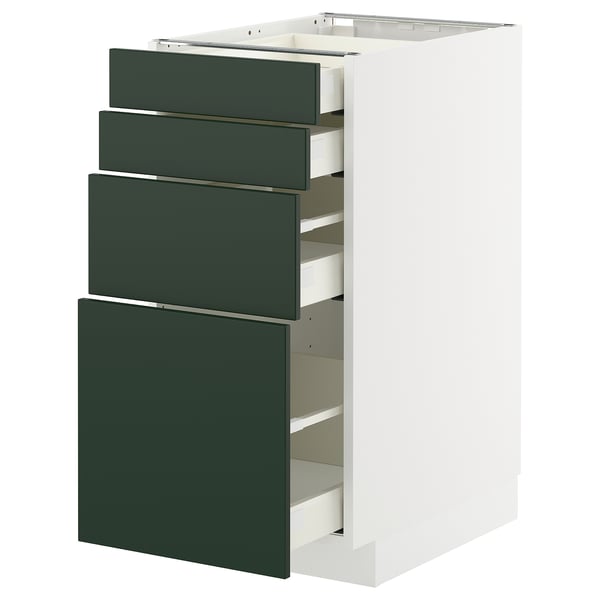 Modern white cabinet with four deep green drawers, sleek handles, and smooth finish.