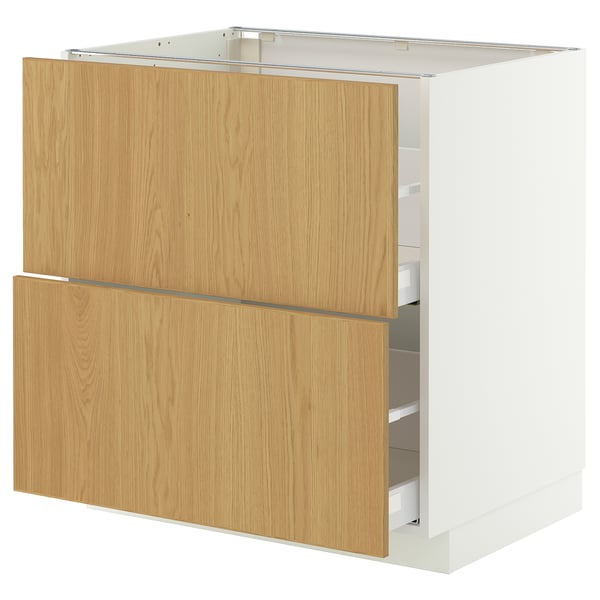 METOD kitchen cabinet with light wood drawers and oak finish.