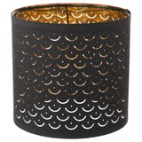 NYMÖ black lamp shade, circular with gold interior & moon cut-outs, creates decorative light patterns. Crafted from polyester, steel, & plastic.