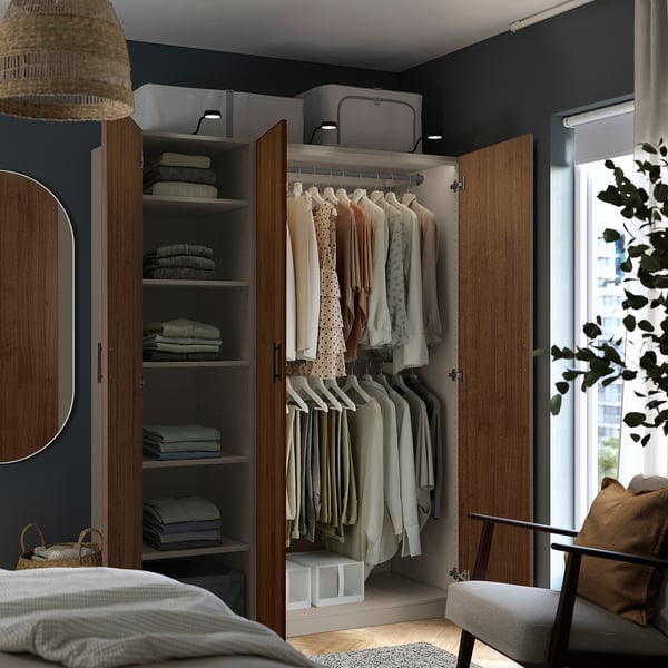 Modern closet with wooden doors, organised clothes, adjustable feet, wall fix.