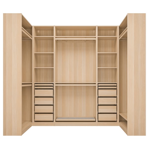 A wooden wardrobe named PAX with shelves, drawers, and hanging space.