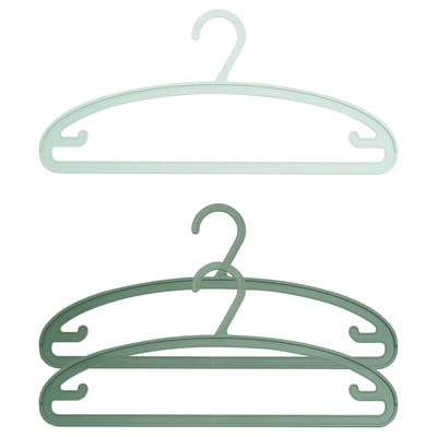 Two pastel green plastic hangers, designed for clothes, with anti-slip functions and extra hooks, one stacked on the other.