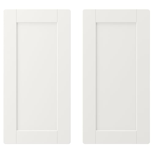 Two white rectangular wardrobe doors with wide frames and rounded corners.