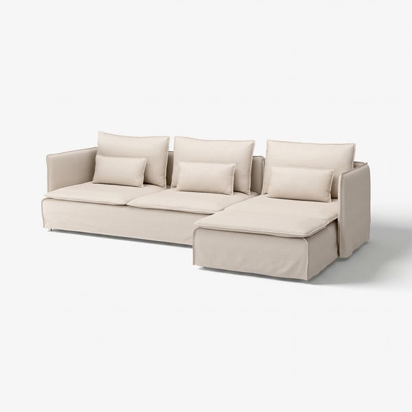 Modern beige sectional sofa with chaise, light grey, clean lines, plush cushions.