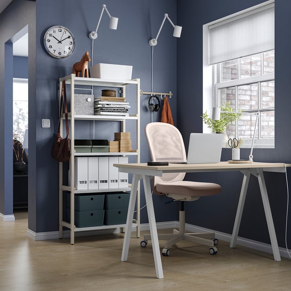 Homespace: TROTTEN white desk, light chair, blue shelves, wooden floor.