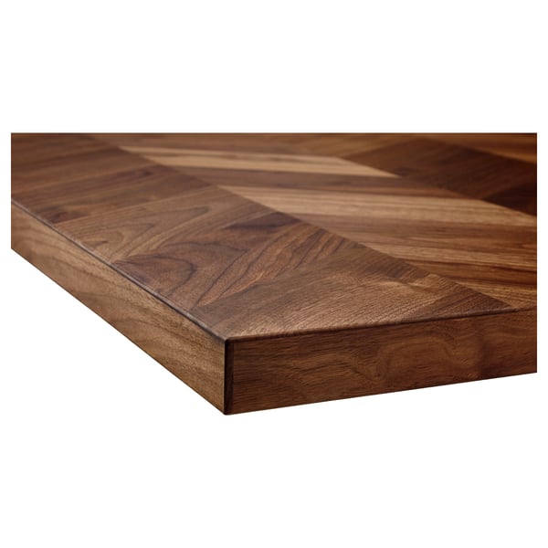 Wooden worktop with rich grain patterns and smooth finish. Thick, polished surface, likely walnut veneer.