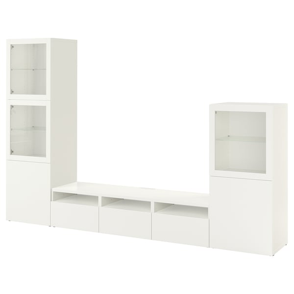 Modern white BESTÅ entertainment unit featuring sleek glass doors, spacious shelves, and adjustable compartments for organised storage.