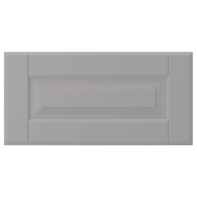 A soft grey BODBYN kitchen cabinet with bevelled panels and a smooth, lacquered surface.