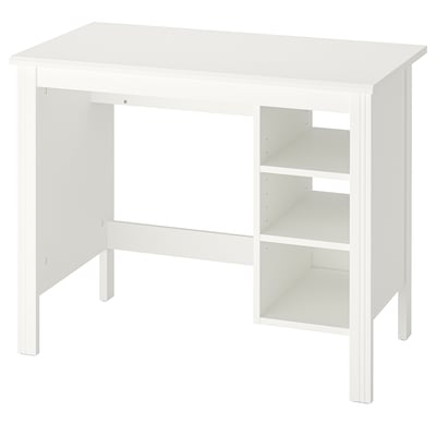 A white BRUSALI desk with adjustable shelves for practical use. Its simple design is suitable for various rooms.