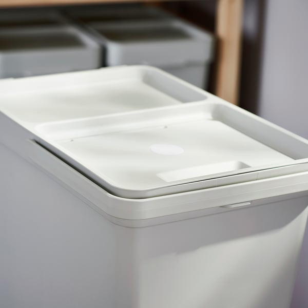 White HÅLLBAR waste bin with lid and handle, made of recycled plastic, rectangular shape, clean and modern design.