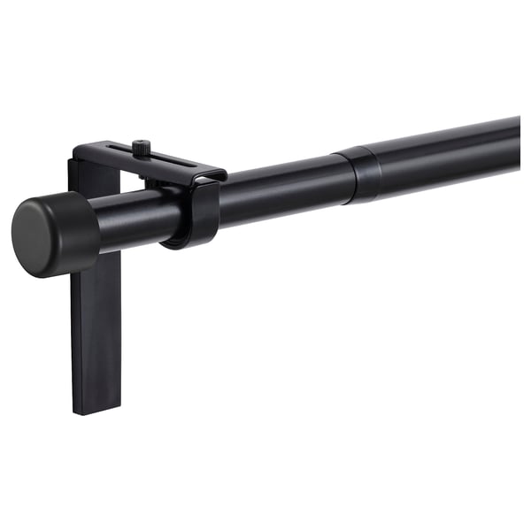 Black HUGAD curtain rod set, extendable, modern design, includes 4 brackets.