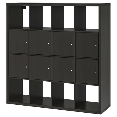 A black KALLAX storage unit with a mix of open and closed compartments, made of particleboard and fibreboard, displaying a modern, modular design.