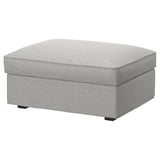 A KIVIK footstool in grey, featuring a rectangular shape with a patterned cover, designed for comfort and durability.