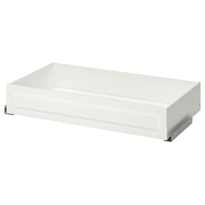KOMPLEMENT white drawer with slow-closing mechanism, made of fibreboard and paper foil, rectangular shape with minimalist design.