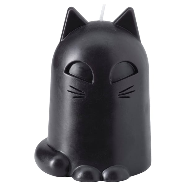 KUSTFYR cat-shaped black candle with happy face and pointed ears.