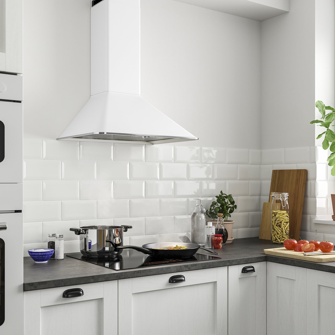 Modern kitchen with white MATTRADITION hood, stove, bowls, and wooden cutting board.