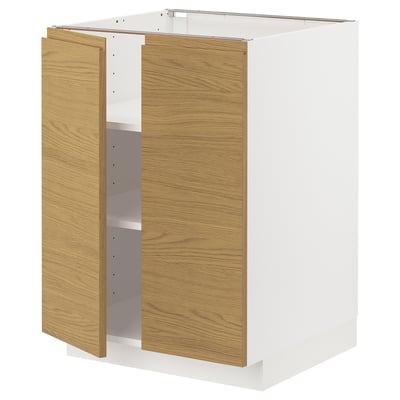 A white METOD kitchen cabinet with wooden doors and minimalist design.