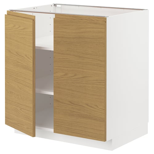 METOD kitchen unit with oak-effect doors, minimalist design, white frame.