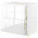 White METOD kitchen unit with glossy finish and integrated handles.