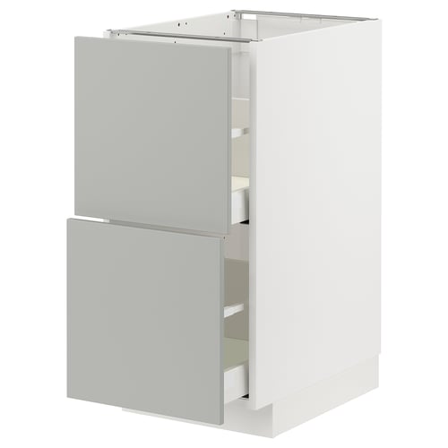 Modern white kitchen cabinet with grey drawers and door. Minimalist design, two accessible drawers, smooth finish.