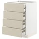 Modern white kitchen unit with beige drawers.