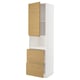 A tall white METOD kitchen storage unit with oak-colored drawers and doors. It both shelves and drawers for storage.