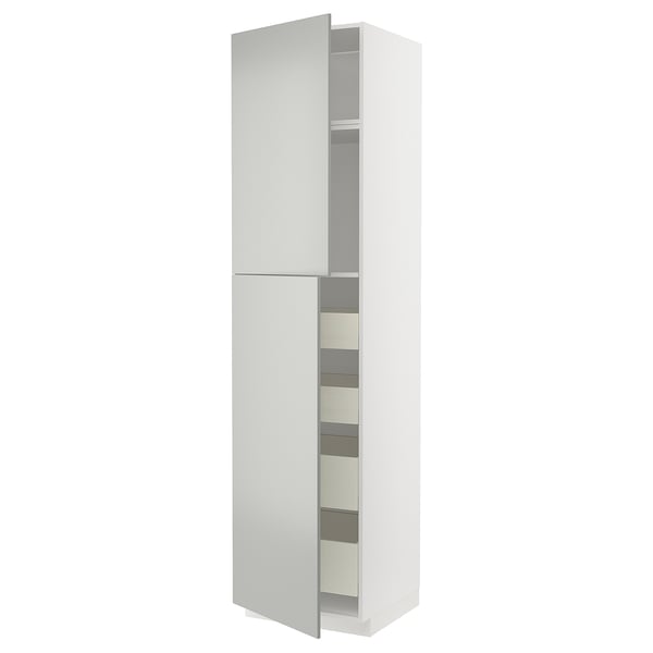 A tall, white ikea METOD kitchen cabinet with gray interior shelves, closed on the right and open on the left revealing storage compartments.