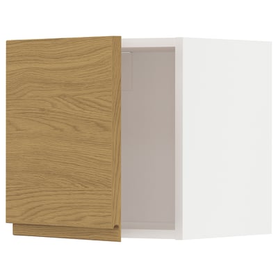 A wooden kitchen cabinet with a white interior.