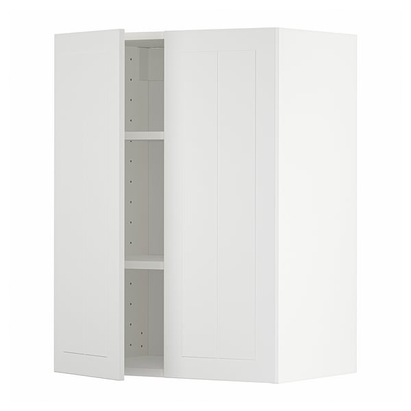 A white METOD wall cabinet with one open door, revealing adjustable shelves inside.