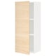 An open METOD kitchen cabinet with light ash wood-patterned door and white interior.