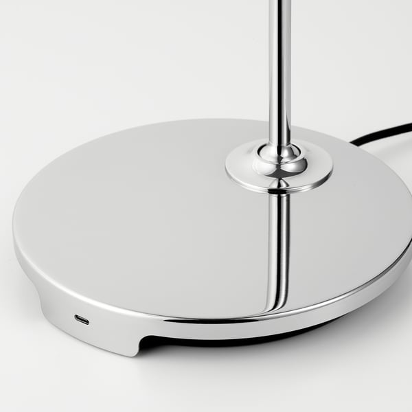 Modern chrome floor lamp with usb-c charging port, sleek design, sturdy base.