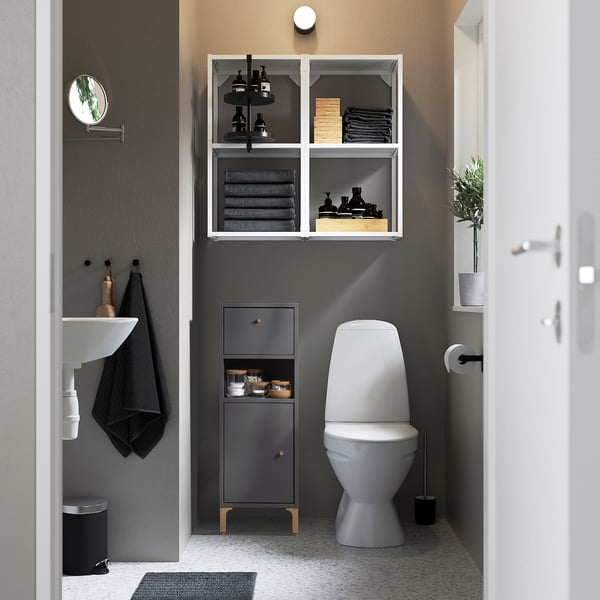 Grey NORSÄLVEN bathroom cabinet with open & hidden storage, perfect for tight spaces.
