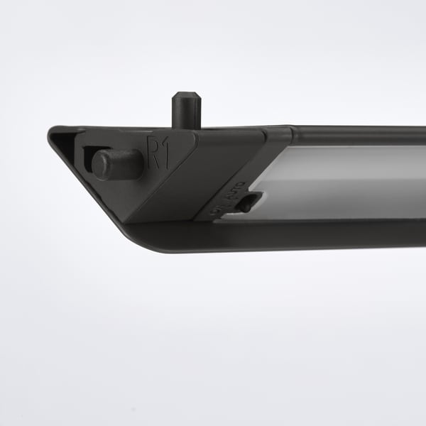 Close-up of sleek, modern led light fixture for wardrobes, showcasing robust design and precise engineering.