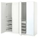 An open white ikea PAX wardrobe unit featuring multiple shelves and storage drawers for organized clothing and accessories.