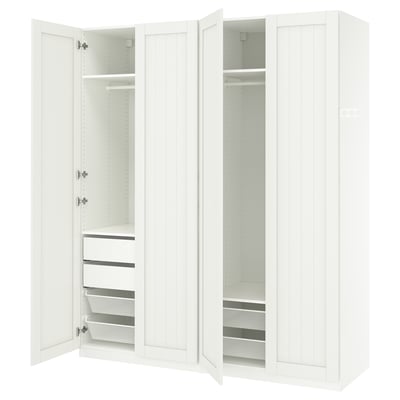 White PAX wardrobe with open doors. Shelves, drawers, and mesh baskets. Minimalist modern design.