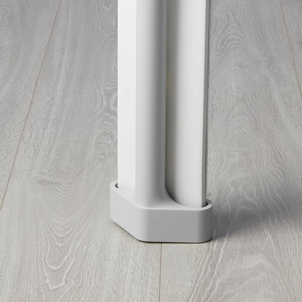 Modern, sleek, white floor mop with sturdy base, standing on light wood floor.