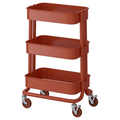An orange, three-tier metal storage trolley, RÅSKOG, with wheels for easy movement.