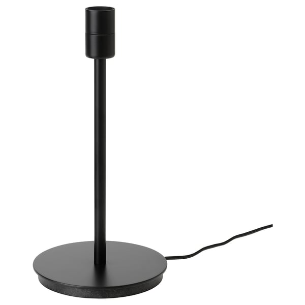 A black SKAFTET lamp base, modern and sleek with a round base and a cylindrical tube, made from powder-coated steel.