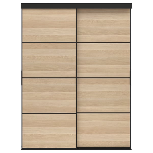 SKYTTA wooden wardrobe with sliding doors, light brown, modern minimalist design.
