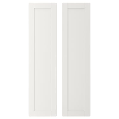 Two white, rectangular, plain cabinet doors with rounded corners.