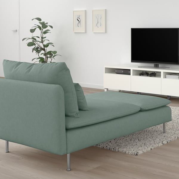 Modern living room with a mint green SÖDERHAMN chaise longue, tv stand, and plant.