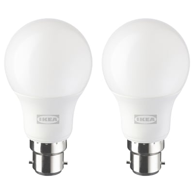 Two white ikea led light bulbs with silver bases, round shape, frosted design.