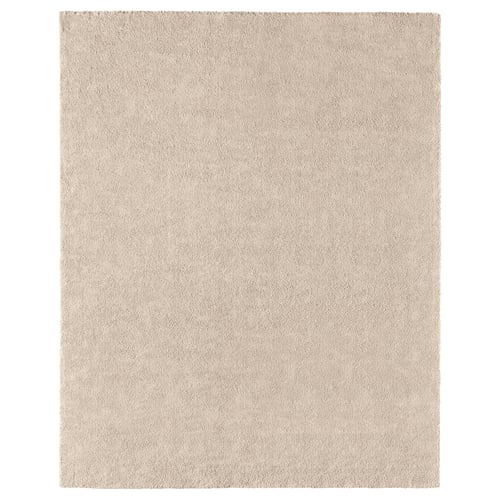 A beige STOENSE rug. Its rectangular, made of polypropylene with a soft, low pile. Ideal for various floors, it dampens sound and is easy to care for.