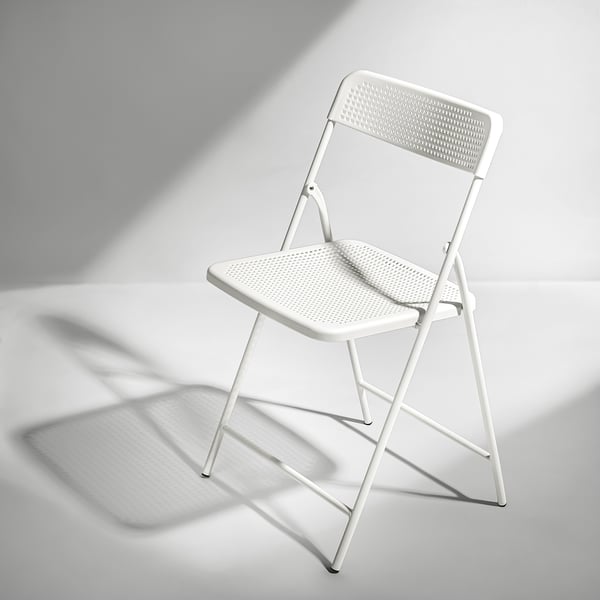 TORPARÖ white folding chair: modern, compact, high back, durable powder-coated steel, ideal for small spaces.