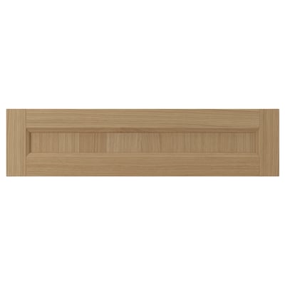 This is a wooden drawer front in natural oak. It solid oak frame with oak veneer panels. The design is modern with natural wood grain visibility.