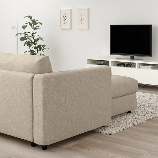 Beige VIMLE sofa, white tv stand, green plant - room focal point.