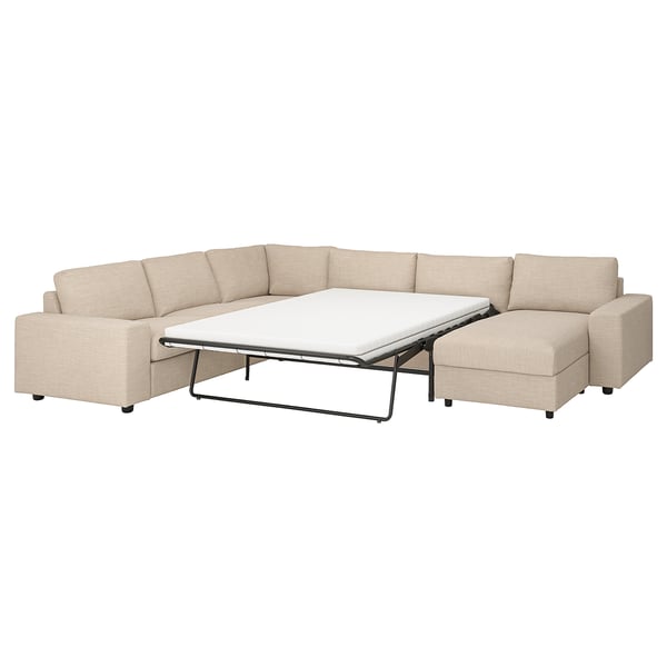 A beige VIMLE sectional sofa-bed with a pull-out mattress, designed for comfort and versatility.